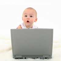 baby behind pc, early child development
