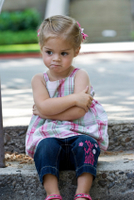 child discipline girl on timeout.