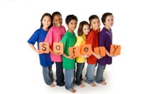 kids with safety sign